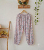 Pink chickenkari shirt along linen bottom